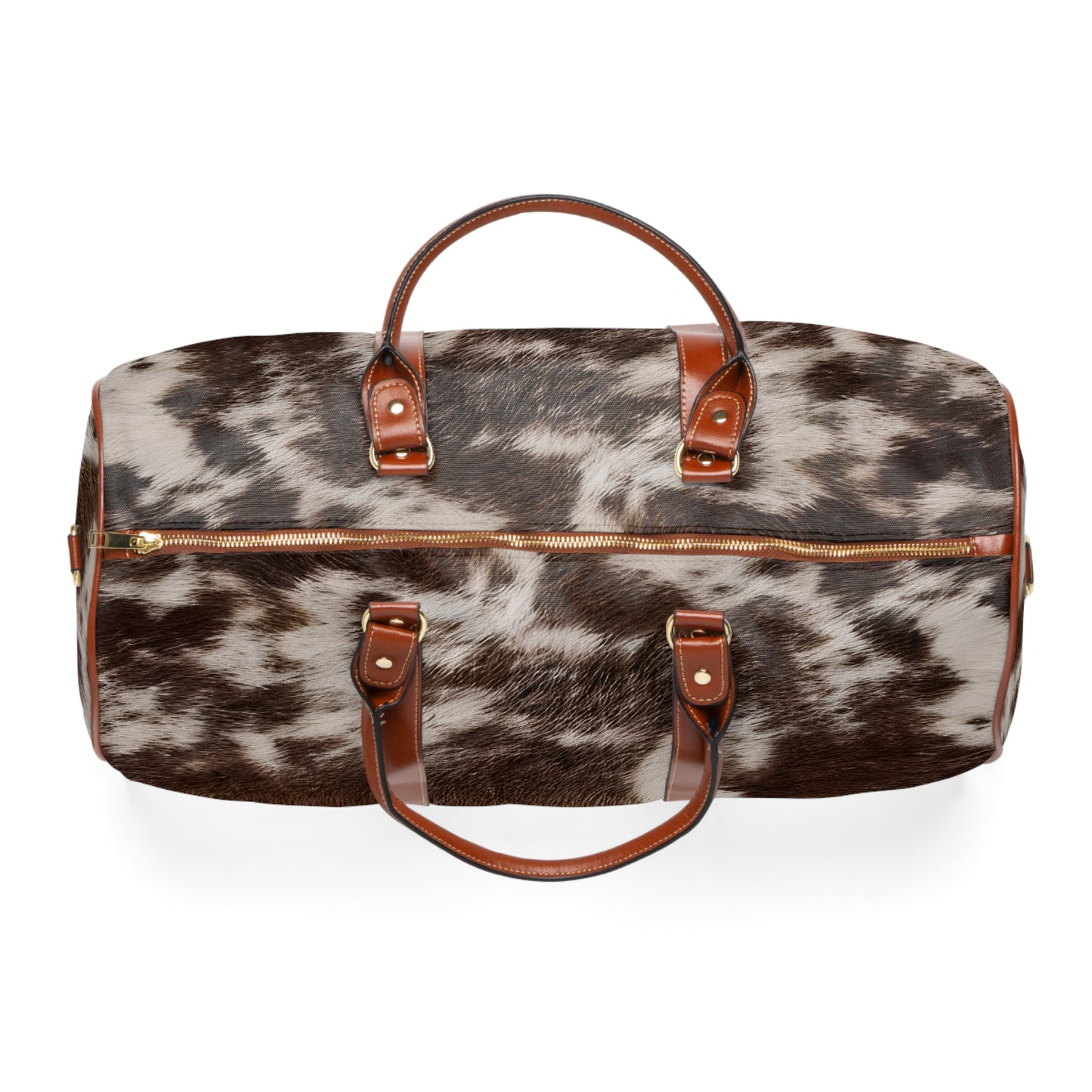 Cow Print Weekender Bag from Texas Diamond D Farms. Designed for the modern traveler with a love for unique, Western-inspired style, this bag features a striking cow print that makes it a standout piece.