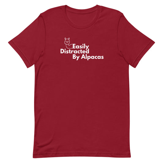 Show off your love for alpacas with our "Easily Distracted by Alpacas" T-Shirt! This charming and comfortable tee is perfect for alpaca enthusiasts who can't help but be captivated by these adorable creatures.