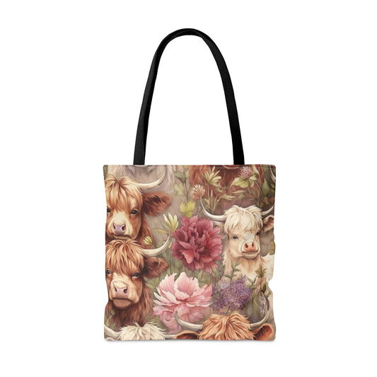 Highland Majesty Meets Floral Elegance: Immerse yourself in the rustic charm of Highland Cows surrounded by blooming beauty. Our tote bag seamlessly blends the regal presence of Highland cattle with the delicate allure of floral artistry.&nbsp;