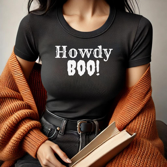 Get ready for spooky season with our Howdy Boo! t-shirt! This fun and festive design perfectly blends Western charm with Halloween spirit, featuring a playful "Howdy Boo!"