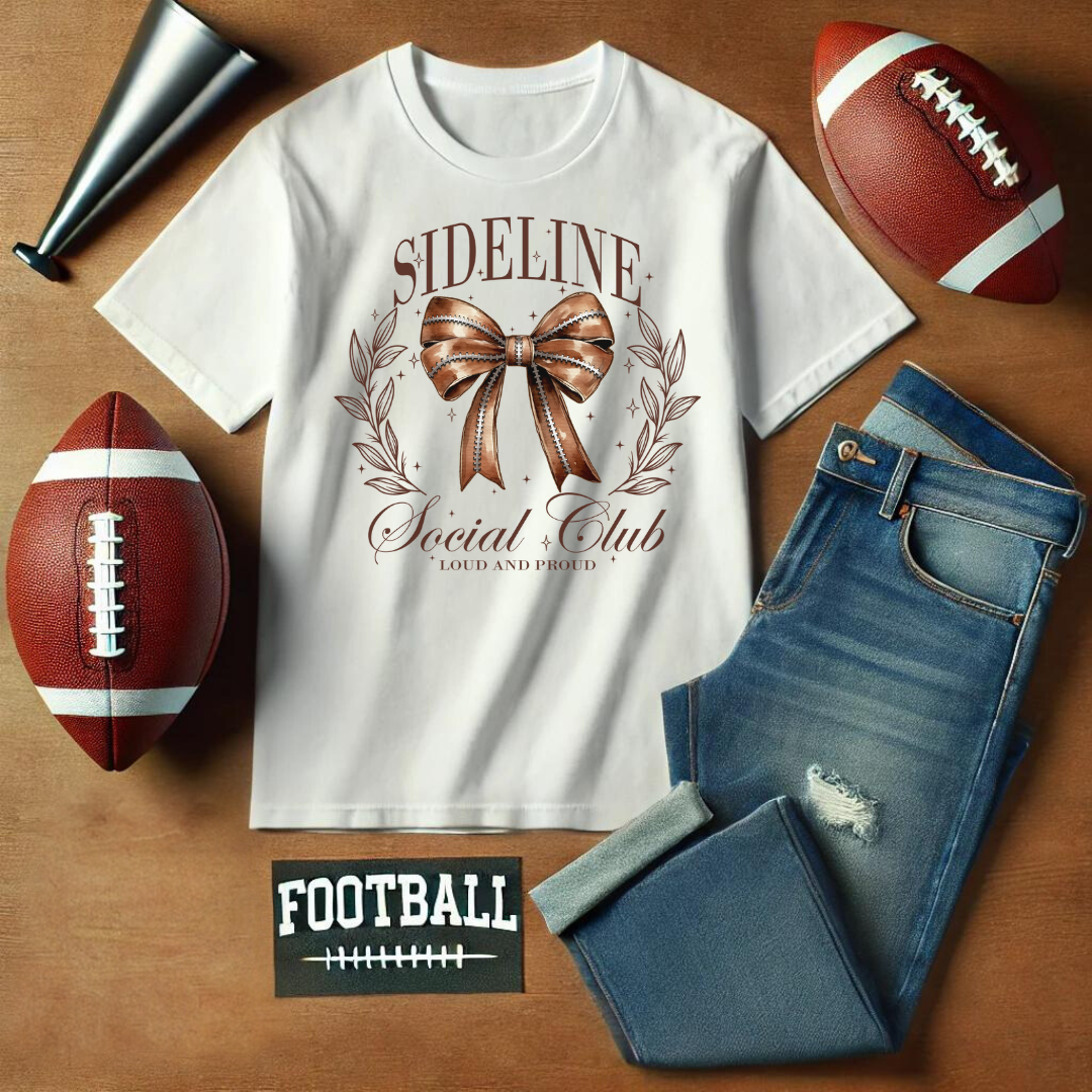 Step up your game day style with our Sideline Social Club t-shirt! This fashionable tee features a bold football-themed bow at its center, surrounded by the empowering text "Sideline Social Club" and "Loud and Proud." Perfect for those who support their team with passion and flair, this shirt is designed for the ultimate fan who loves to cheer from the sidelines in style.