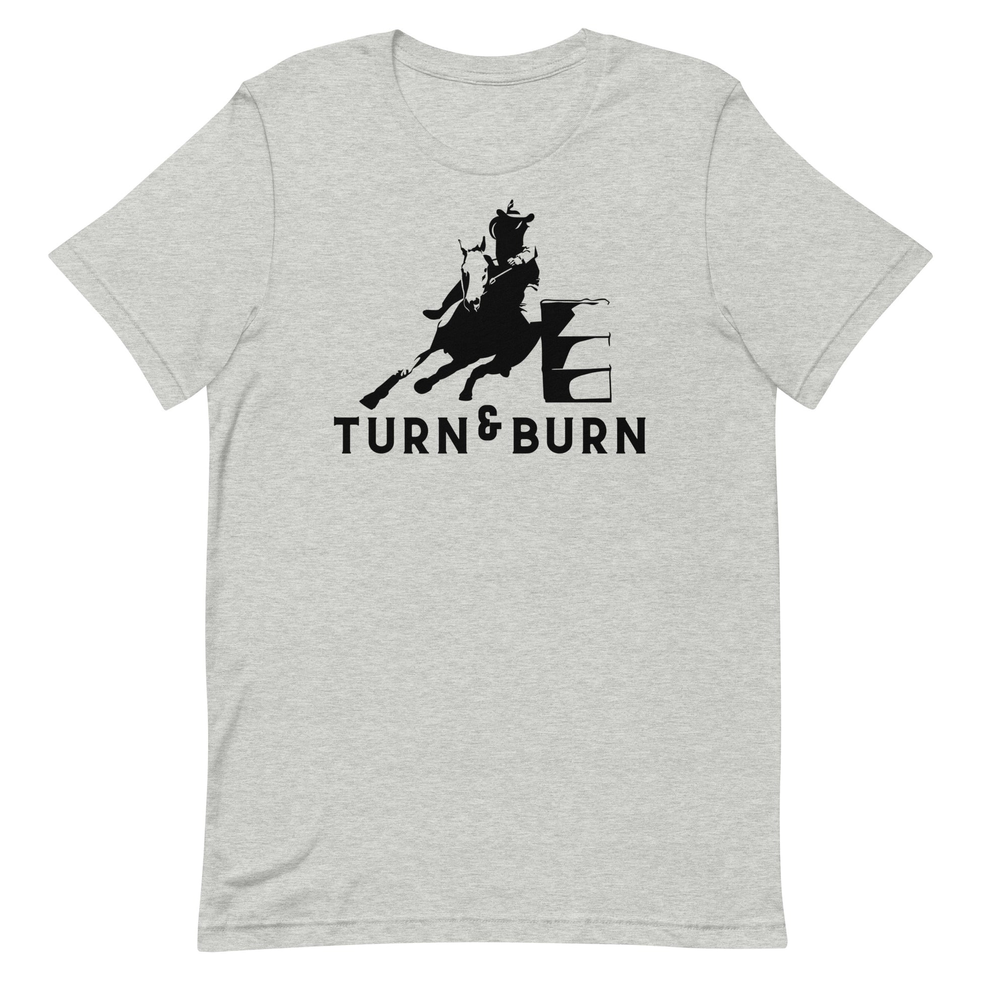 Rev up your rodeo style with our 'Turn and Burn' Barrel Racer T-shirt! Inspired by the adrenaline-fueled world of barrel racing, this tee captures the heart-pounding excitement of each tight turn and lightning-fast run. Crafted from premium materials for comfort and durability, it's perfect for both riders and rodeo enthusiasts alike. Whether you're hitting the arena or cheering from the sidelines, let your passion for the sport shine with our 'Turn and Burn' T-shirt