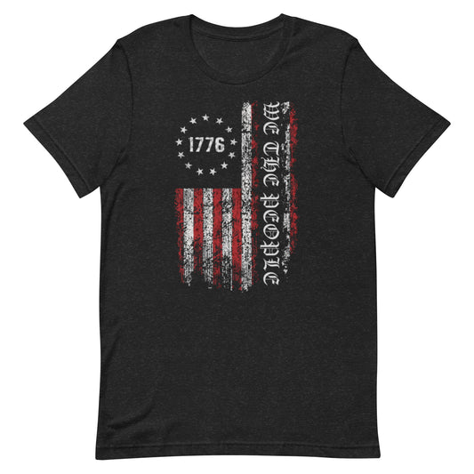 Embrace the roots of American freedom with our "1776 We The People" T-shirt, a tribute to the year that marked the beginning of a new era. This vintage-inspired design features a distressed American flag alongside the iconic phrase from the U.S. Constitution, making it a profound statement of patriotism and history.